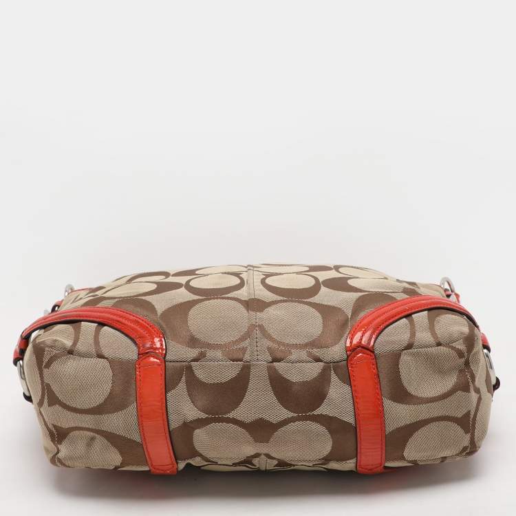 Pre Owned Coach Beige/Orange Signature Canvas and Patent Leather Katarina Hobo