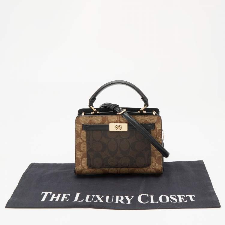 Pre Owned Coach Black/Brown Signature Coated Canvas and Leather Mini Lane Tote