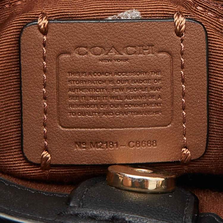 Pre Owned Coach Black/Brown Signature Coated Canvas and Leather Mini Lane Tote