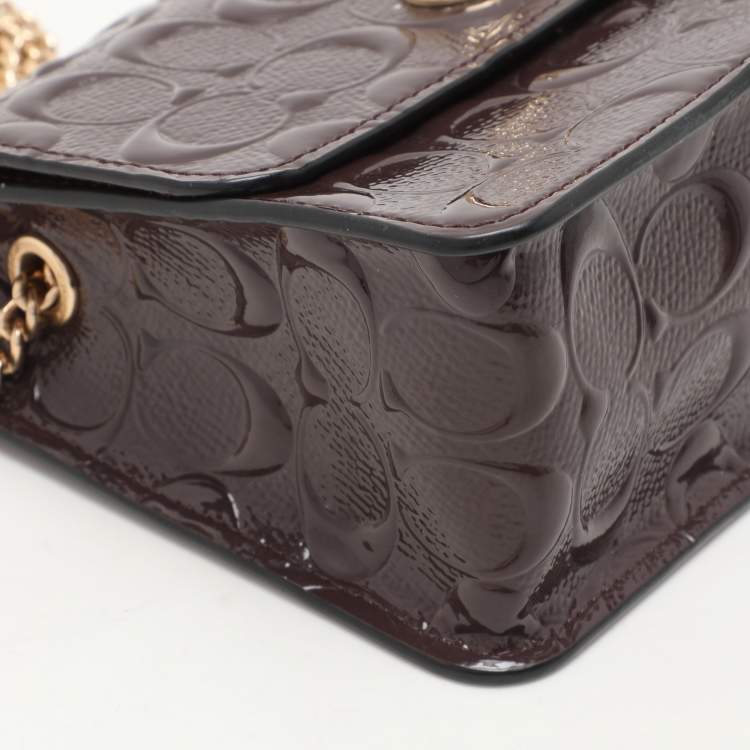 Pre Owned Coach Brown Logo Embossed Patent Leather Bowery Crossbody Bag