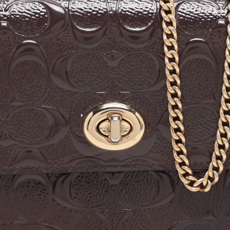 Pre Owned Coach Brown Logo Embossed Patent Leather Bowery Crossbody Bag