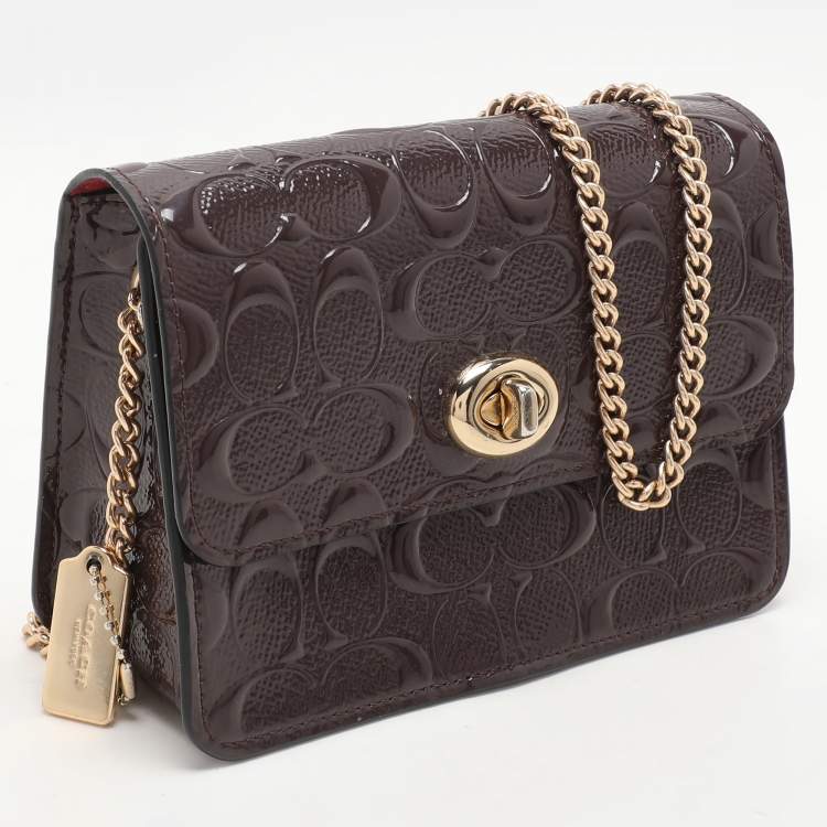 Pre Owned Coach Brown Logo Embossed Patent Leather Bowery Crossbody Bag