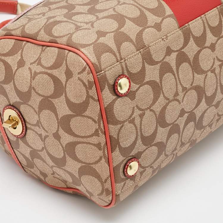 Pre Owned Coach Beige/Orange Signature Coated Canvas and Leather Duffel Bag