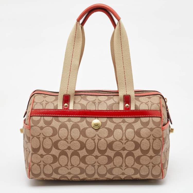 Pre Owned Coach Beige/Orange Signature Coated Canvas and Leather Duffel Bag
