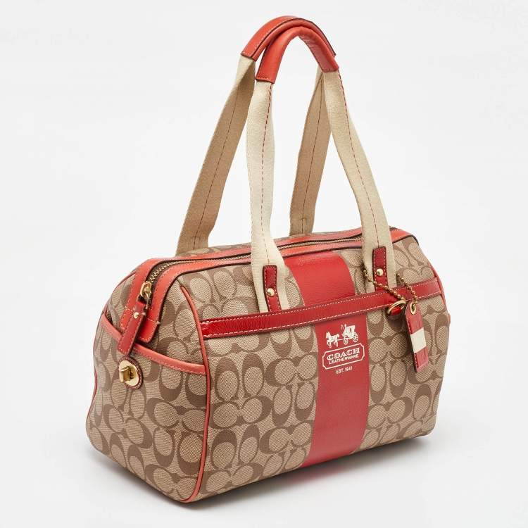 Pre Owned Coach Beige/Orange Signature Coated Canvas and Leather Duffel Bag