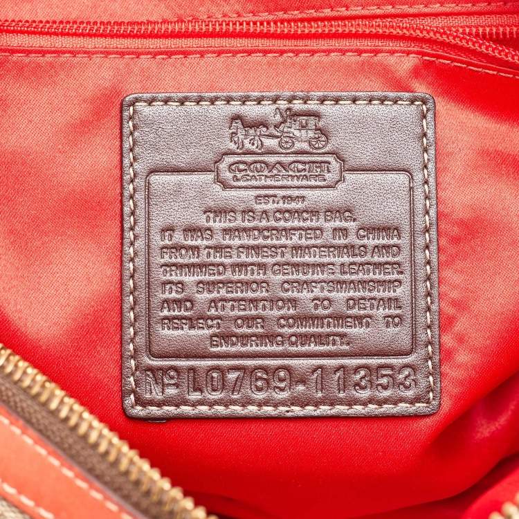 Pre Owned Coach Beige/Orange Signature Coated Canvas and Leather Duffel Bag
