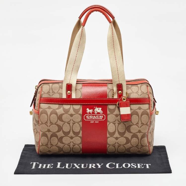 Pre Owned Coach Beige/Orange Signature Coated Canvas and Leather Duffel Bag