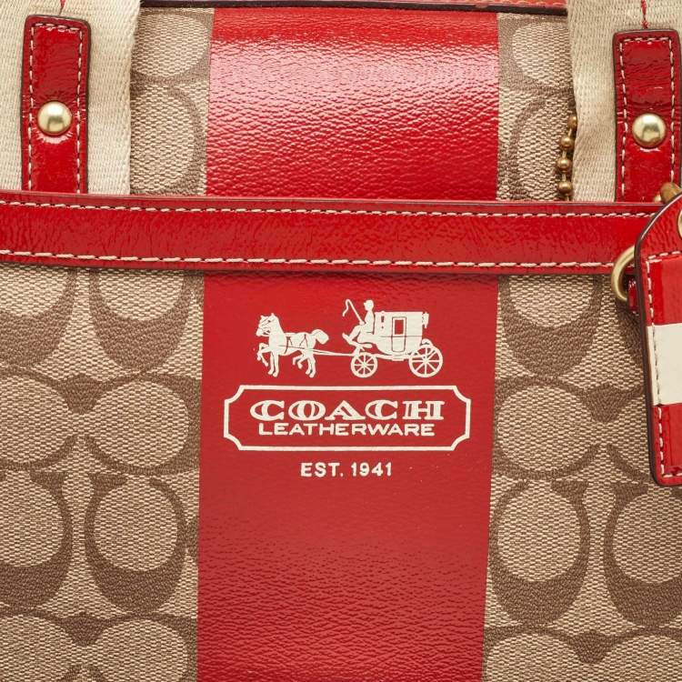 Pre Owned Coach Beige/Orange Signature Coated Canvas and Leather Duffel Bag