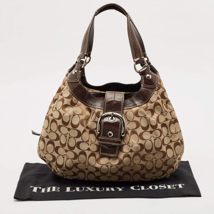 Pre Owned Coach Beige/Brown Signature Canvas and Leather Soho Lynn Hobo