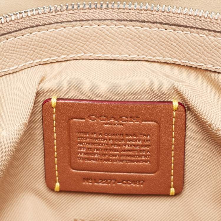 Pre Owned Coach Beige Leather Wyn Wristlet Pouch