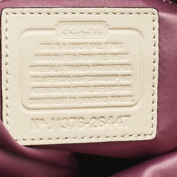 Pre Owned Coach Beige Signature Canvas and Leather Edie 31 Satchel
