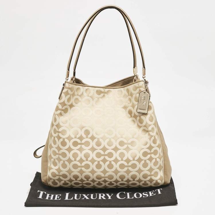Pre Owned Coach Beige Signature Canvas and Leather Edie 31 Satchel