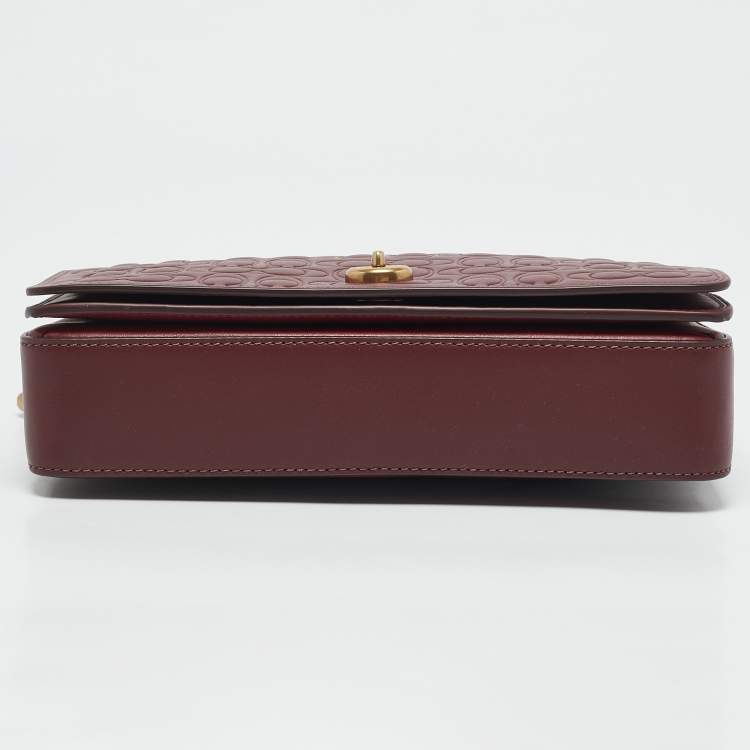 Pre Owned Coach Burgundy Signature Embossed Leather Dinky Crossbody Bag