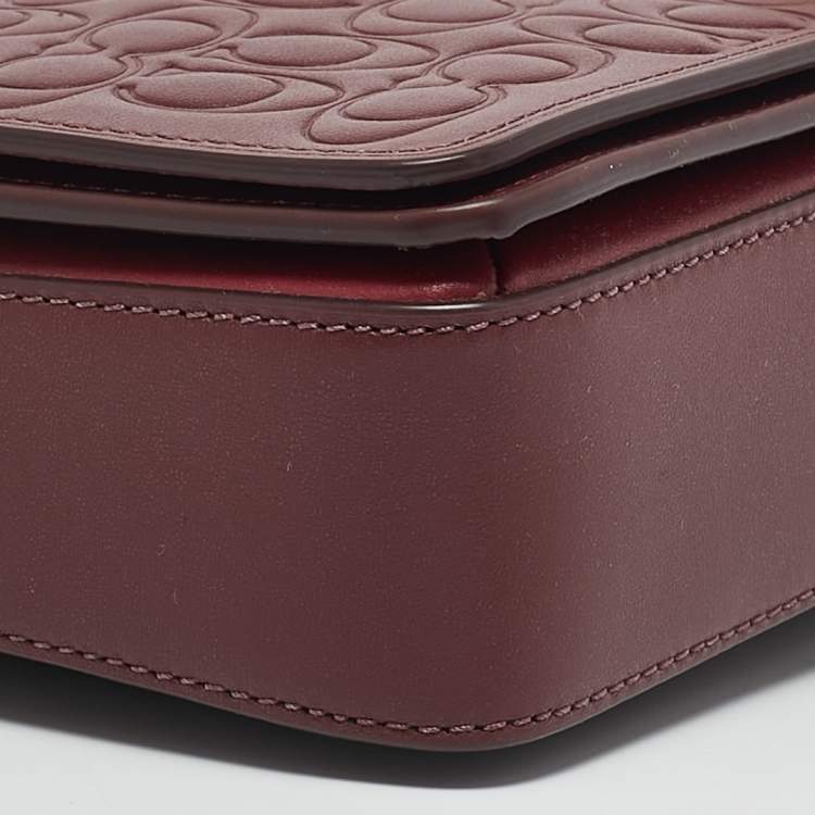 Pre Owned Coach Burgundy Signature Embossed Leather Dinky Crossbody Bag
