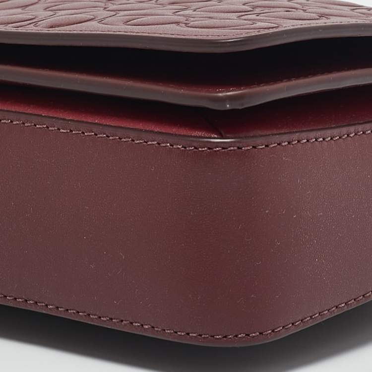 Pre Owned Coach Burgundy Signature Embossed Leather Dinky Crossbody Bag