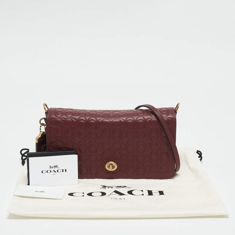 Pre Owned Coach Burgundy Signature Embossed Leather Dinky Crossbody Bag