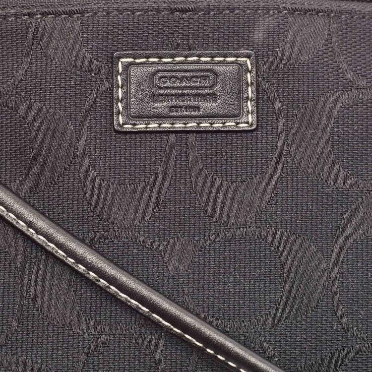 Pre Owned Coach Black Signature Canvas and Leather Wristlet Clutch