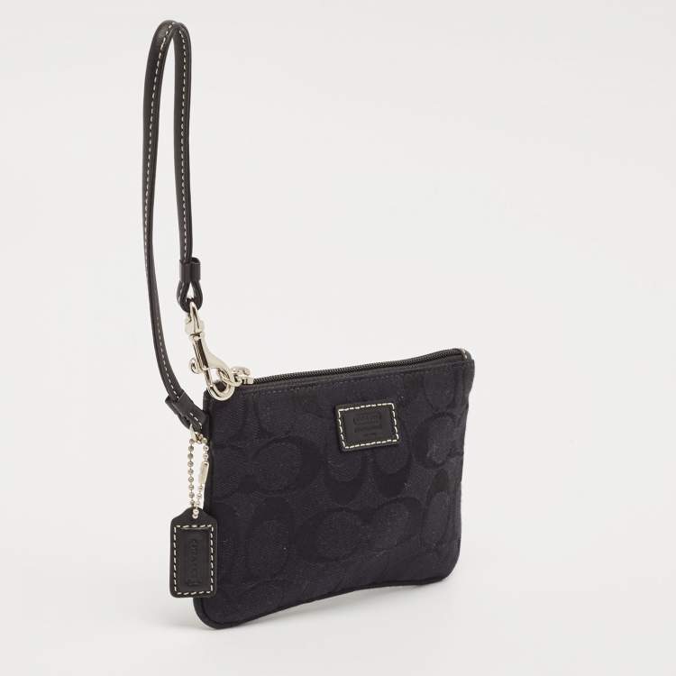 Pre Owned Coach Black Signature Canvas and Leather Wristlet Clutch