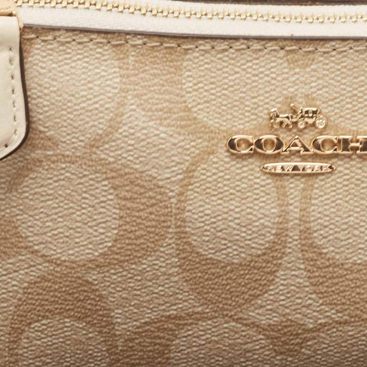 Pre Owned Coach Beige Signature Coated Canvas Double Corner Zip Wristlet Pouch