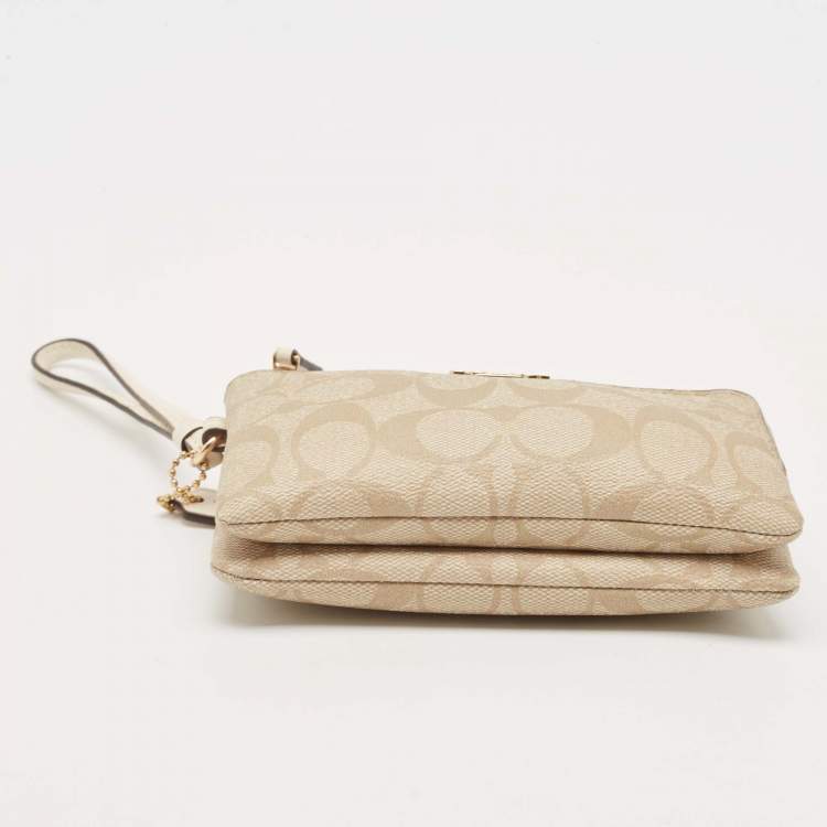 Pre Owned Coach Beige Signature Coated Canvas Double Corner Zip Wristlet Pouch