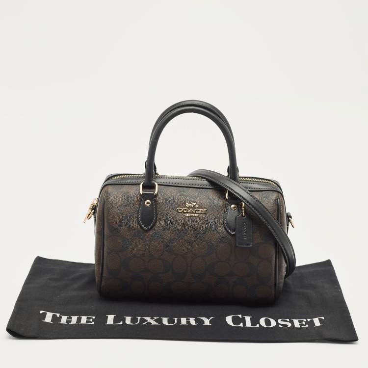 Pre Owned Coach Black/Brown Signature Coated Canvas and Leather Rowan Boston Bag