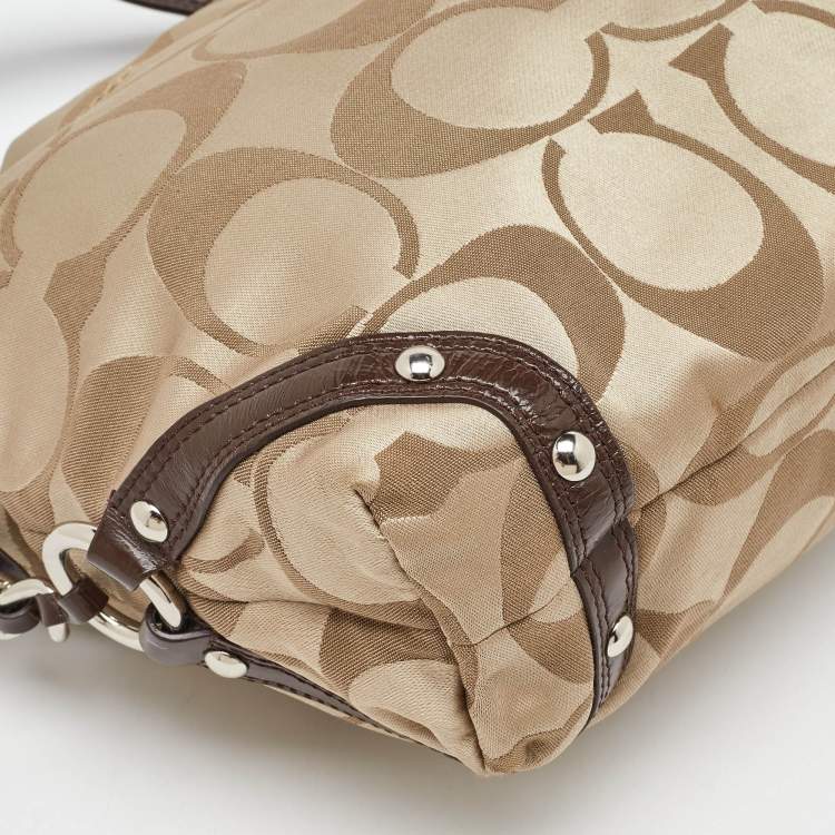 Pre Owned Coach Beige/Dark Brown Signature Canvas and Patent Leather Carly Hobo