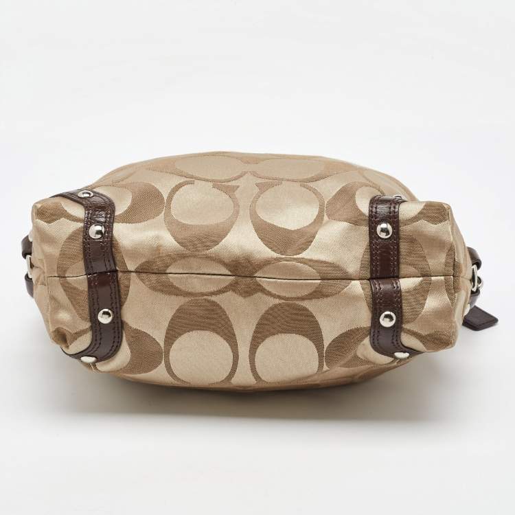 Pre Owned Coach Beige/Dark Brown Signature Canvas and Patent Leather Carly Hobo