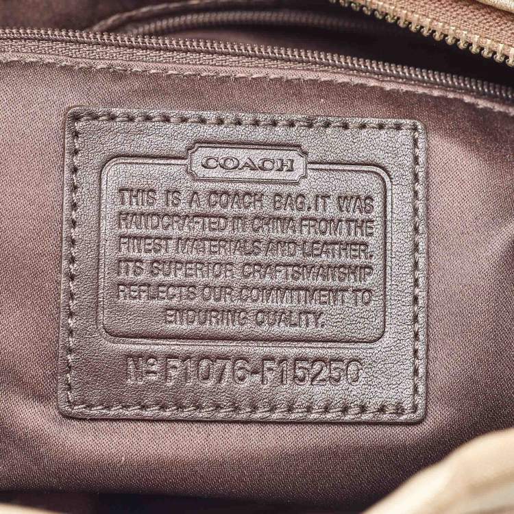 Pre Owned Coach Beige/Dark Brown Signature Canvas and Patent Leather Carly Hobo