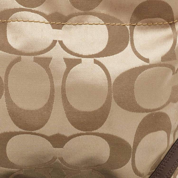Pre Owned Coach Beige/Dark Brown Signature Canvas and Patent Leather Carly Hobo