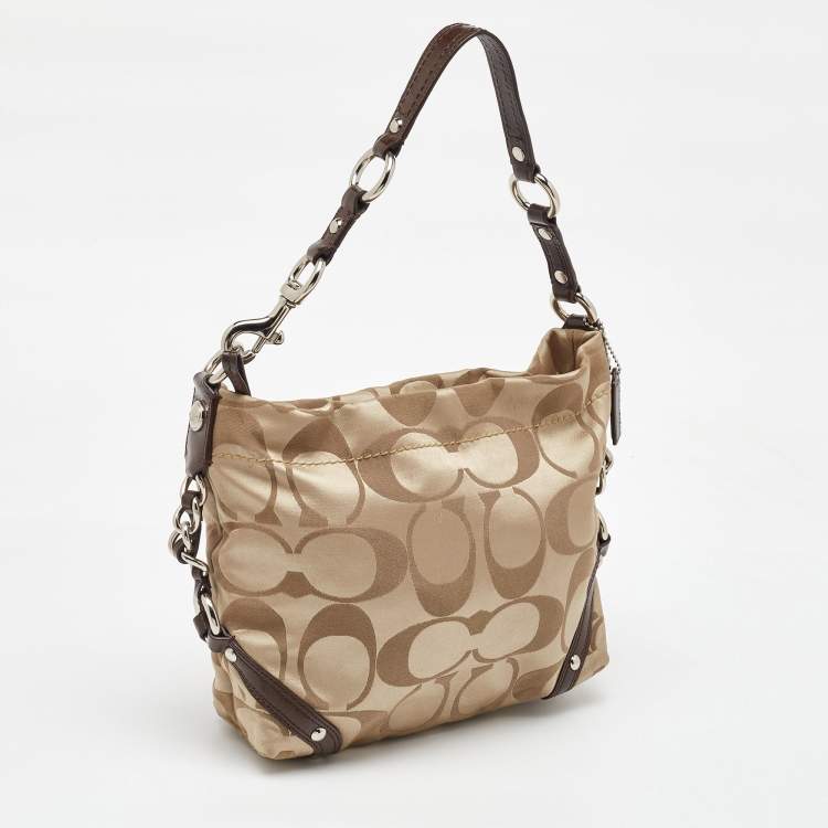 Pre Owned Coach Beige/Dark Brown Signature Canvas and Patent Leather Carly Hobo
