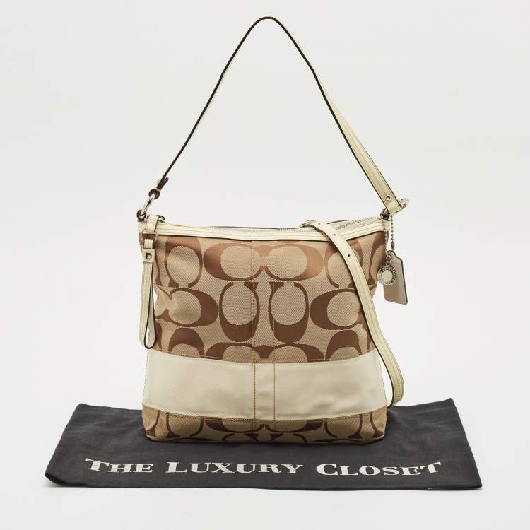 Pre Owned Coach Beige/White Signature Canvas and Leather Messenger Bag