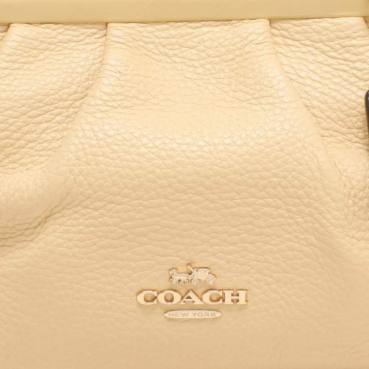 Pre Owned Coach Yellow Leather Nora Kisslock Crossbody Bag