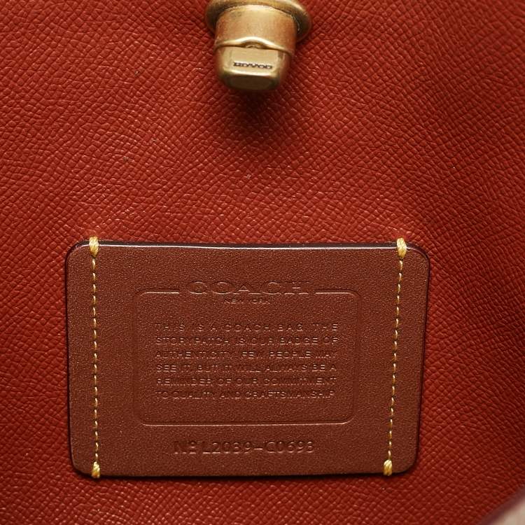 Pre Owned Coach Beige/Brown Signature Coated Canvas and Leather Willow Tote