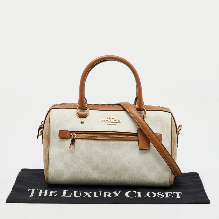 Pre Owned Coach Off White/Brown Signature Coated Canvas and Leather Rowan Boston Bag
