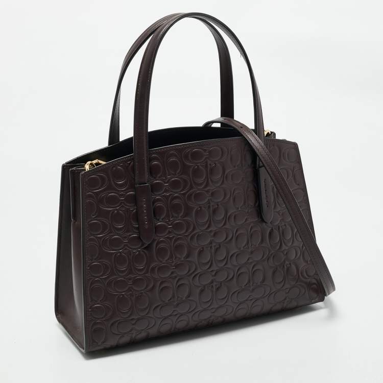 Pre Owned Coach Burgundy Signature Leather Charlie Carryall 28 Bag