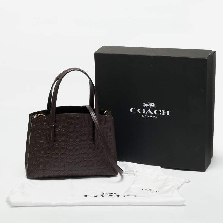Pre Owned Coach Burgundy Signature Leather Charlie Carryall 28 Bag