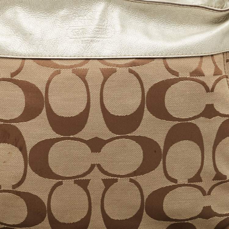 Pre Owned Coach Beige/Silver Signature Canvas and Leather Zoe Hobo
