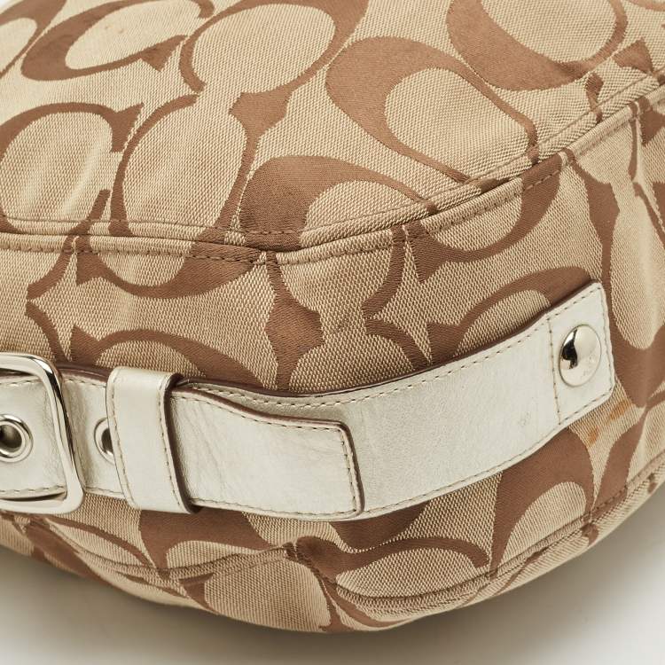 Pre Owned Coach Beige/Silver Signature Canvas and Leather Zoe Hobo