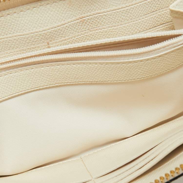 Pre Owned Coach White Signature Embossed Leather Long Zip Around Wallet