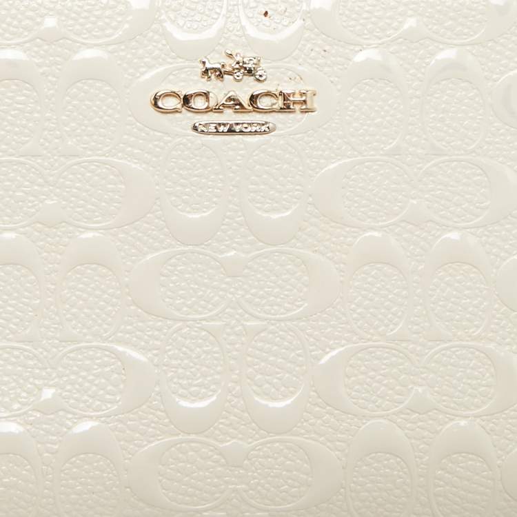Pre Owned Coach White Signature Embossed Leather Long Zip Around Wallet