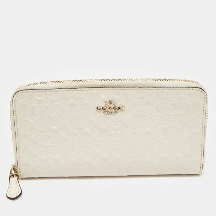 Pre Owned Coach White Signature Embossed Leather Long Zip Around Wallet