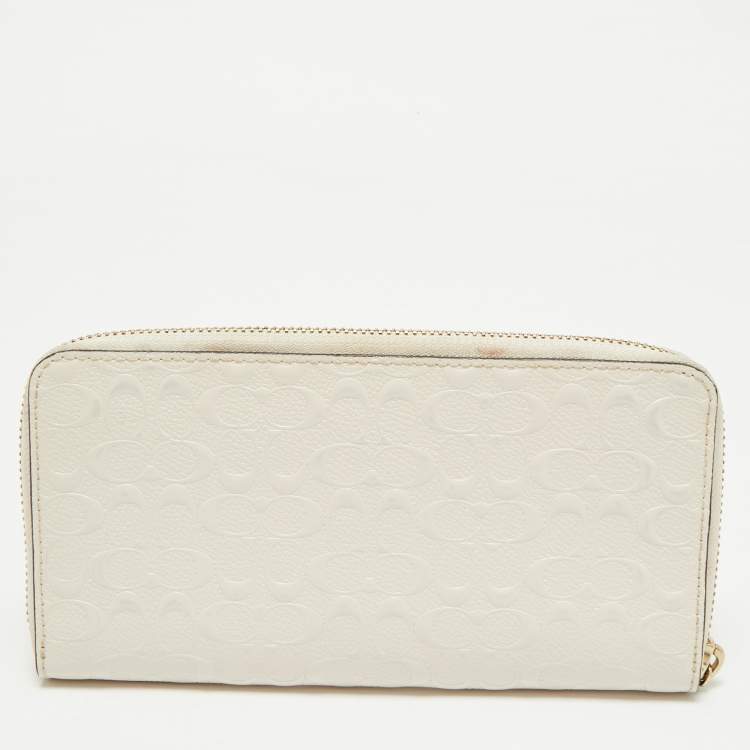 Pre Owned Coach White Signature Embossed Leather Long Zip Around Wallet