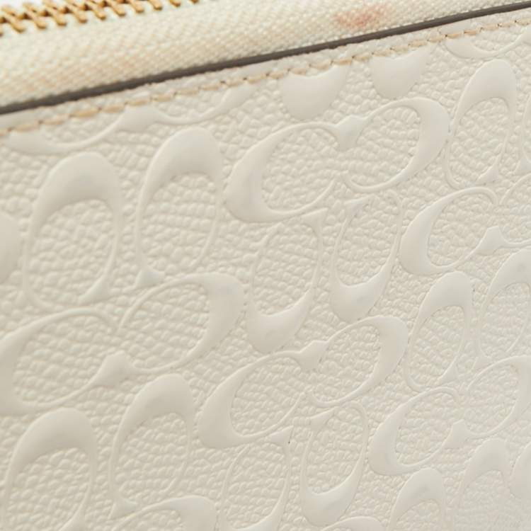 Pre Owned Coach White Signature Embossed Leather Long Zip Around Wallet