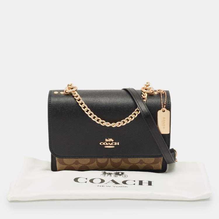 Pre Owned Coach Black/Brown Signature Coated Canvas and Leather Klare Crossbody Bag