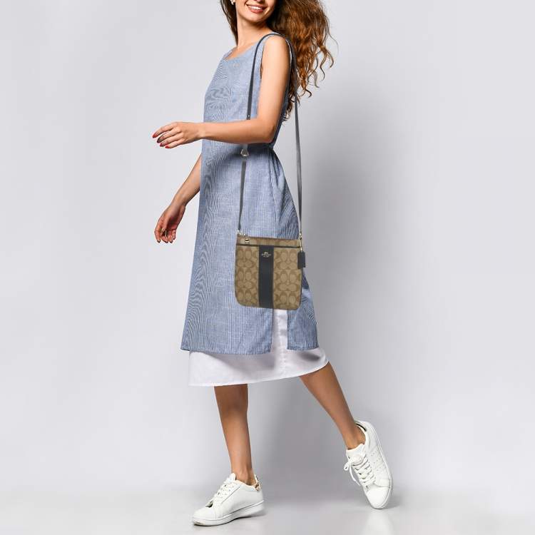 Pre Owned Coach Beige/Blue Signature Coated Canvas and Leather Kitt Crossbody Bag