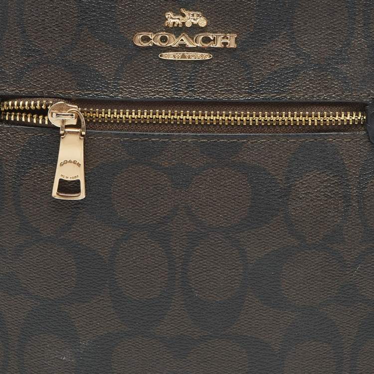 Pre Owned Coach Black/Brown Signature Coated Canvas and Leather Mini Rowan Messenger Bag