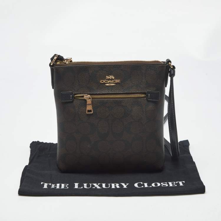 Pre Owned Coach Black/Brown Signature Coated Canvas and Leather Mini Rowan Messenger Bag
