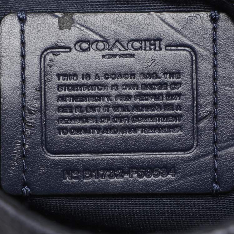 Pre Owned Coach Navy Blue Signature Coated Canvas and Leather Reversible Flap Crossbody Bag