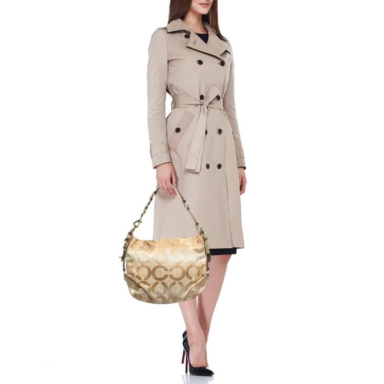 Pre Owned Coach Gold Signature Canvas and Leather Carly Hobo