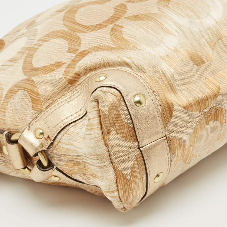 Pre Owned Coach Gold Signature Canvas and Leather Carly Hobo